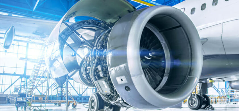 Home silver airplane in a hanger contains wire from a wire company