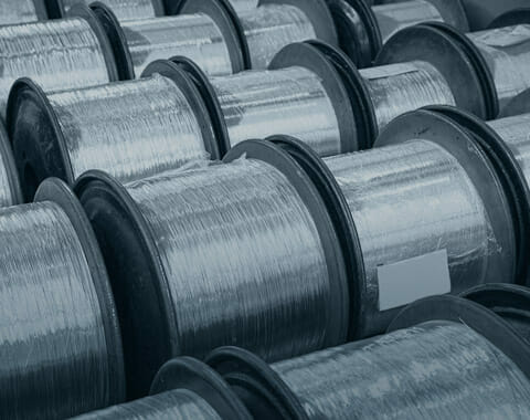 Buy Bulk Wire | Get the Best Value from Wire Manufacturers Multiple bulk wire spools lined up in rows