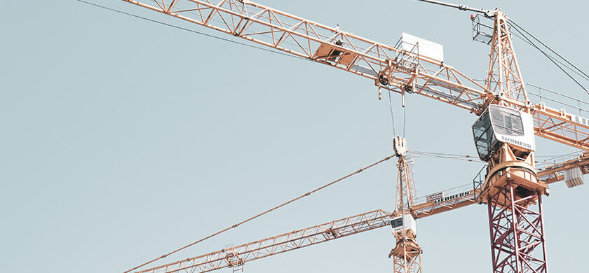 Home orange crane that uses wire from a wire company